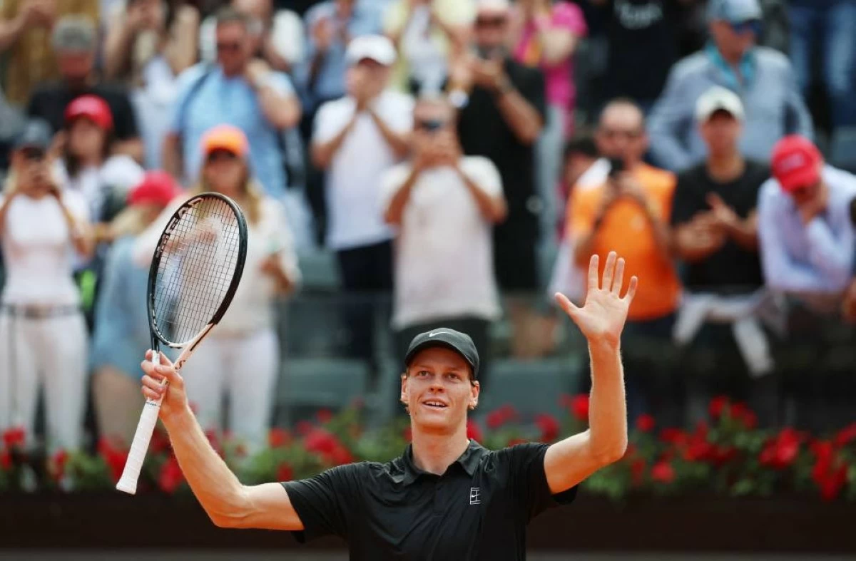 Italy's Jannik Sinner celebrates after winning his round of 16 match against Italy's Andrea Pellegrino at the Italian Open. REUTERS/Claudia Greco