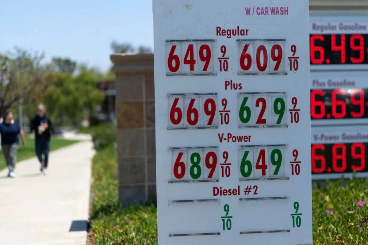 The current price of gasoline is shown at a gas station in Encinitas, California, U.S. REUTERS