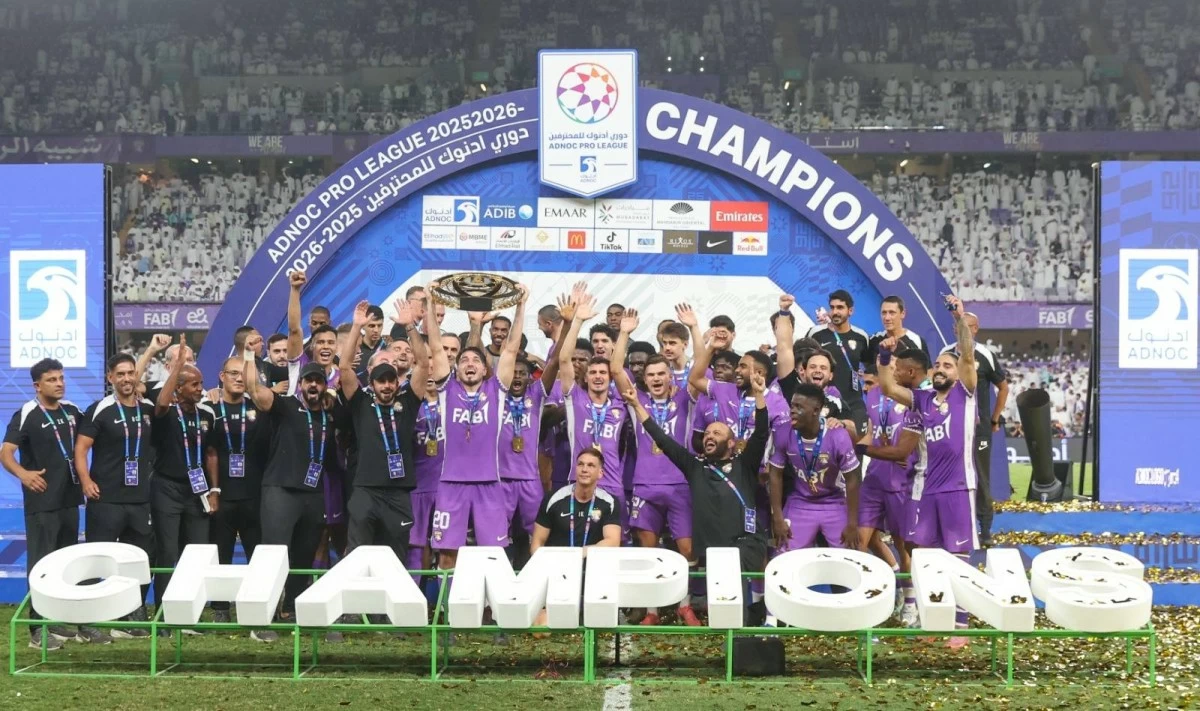 Al Ain FC celebrate with the champions' trophy after defeating Dibba FC 4-0 at Hazza Bin Zayed Stadium in Al Ain during the Adnoc Pro League Final in Al Ain, May 16, 2026. (Photo by Dennis Mallari)