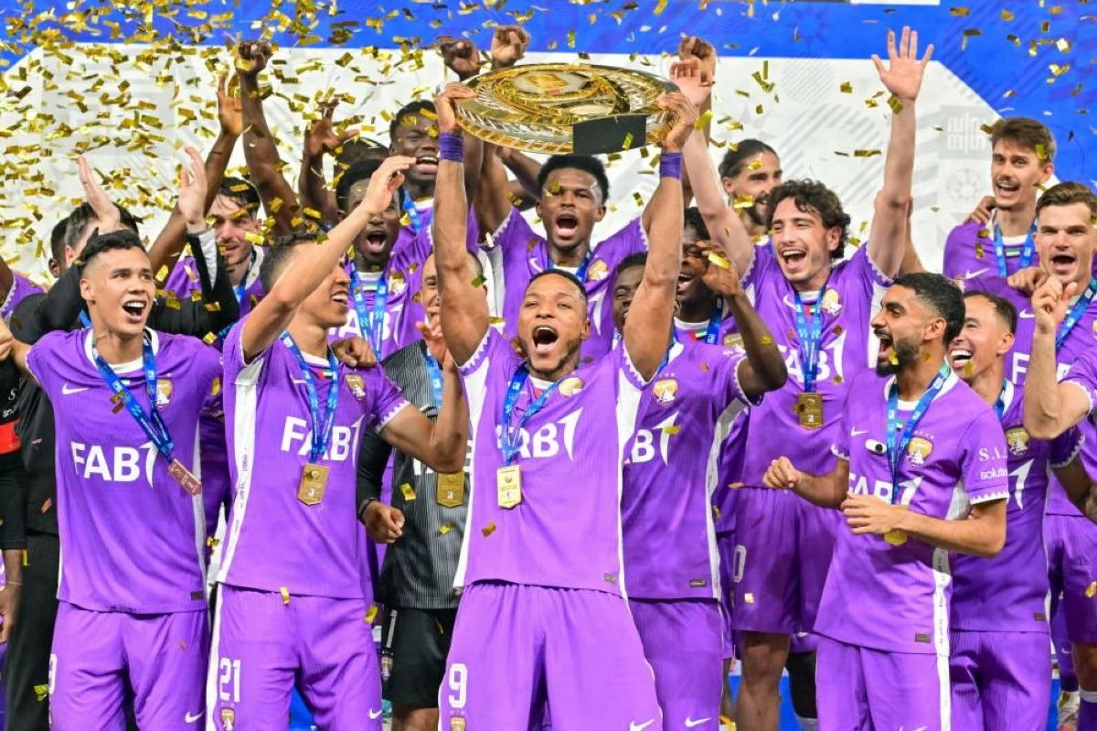 Al Ain FC celebrate with the champions' trophy after defeating Dibba FC 4-0 at Hazza Bin Zayed Stadium in Al Ain during the Adnoc Pro League Final in Al Ain, May 16, 2026. (Photo by Patrick Castillo)