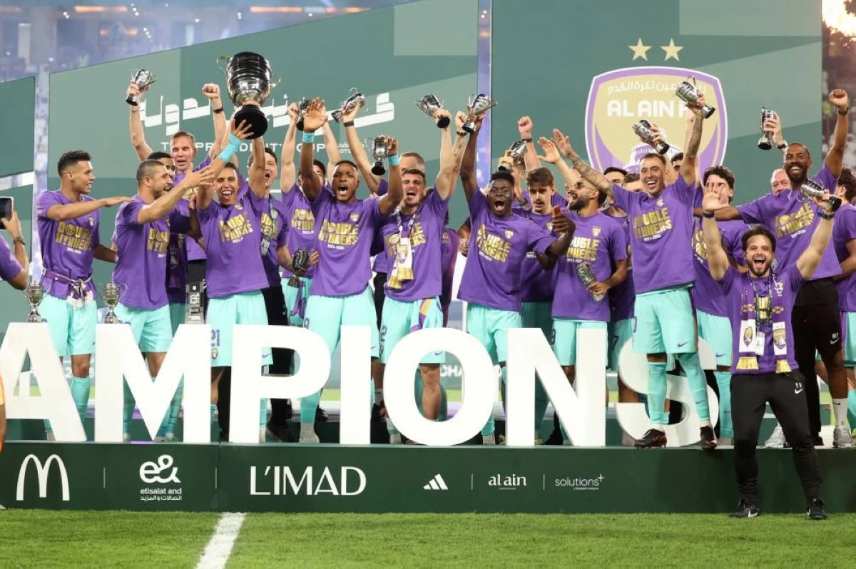 Al Ain players celebrate with Presidents Cup at Mohammed bin Zayed Stadium after beating Al Jazira 4-1, on Friday 22 May 2026. (Photo; Salem Khamis)