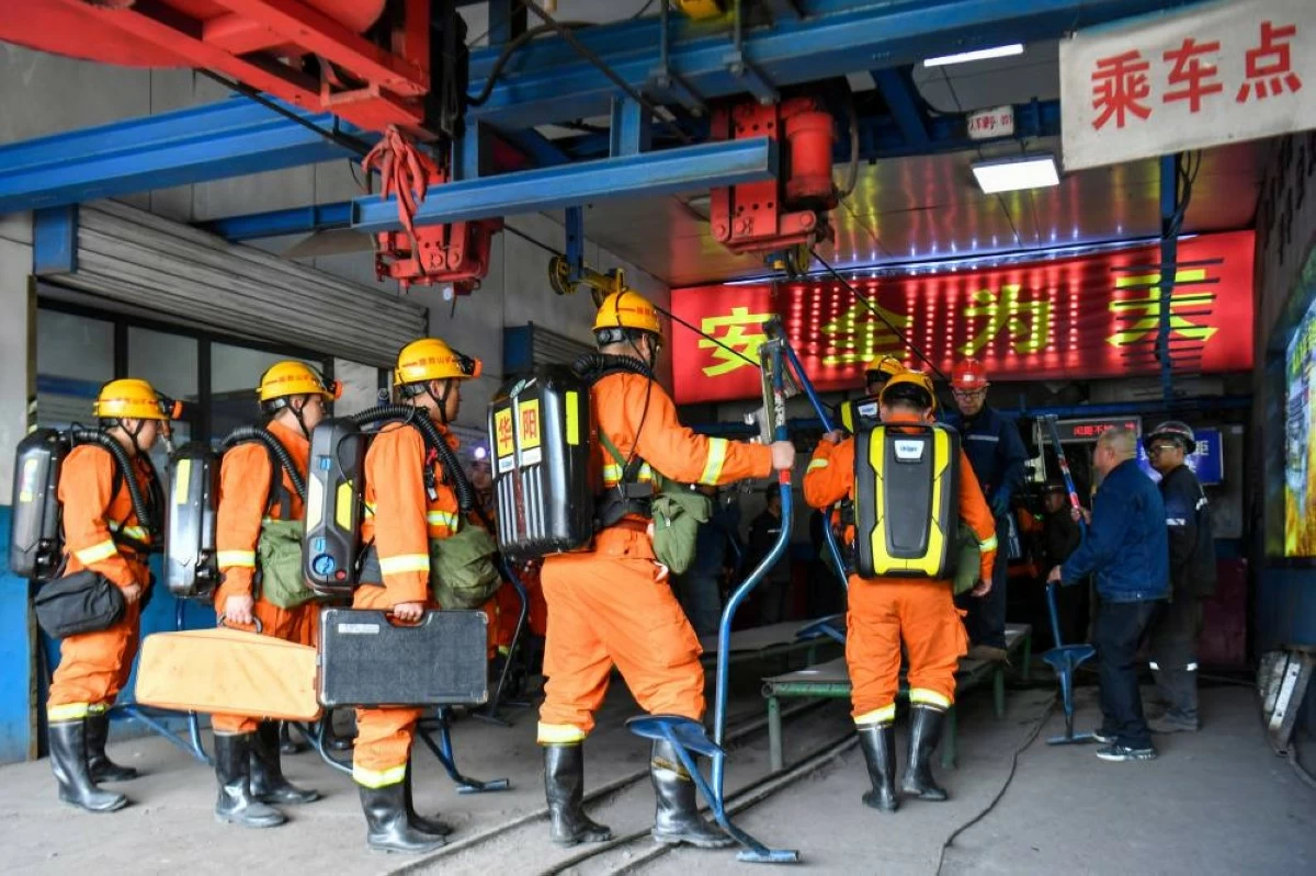Rescue workers prepare to descend into a coal mine in the aftermath of an explosion at Changzhi city's Liushenyu coal mine in Qinyuan county, northern China's Shanxi Province on Saturday, May 23, 2026. (Cao Yang/Xinhua via AP)