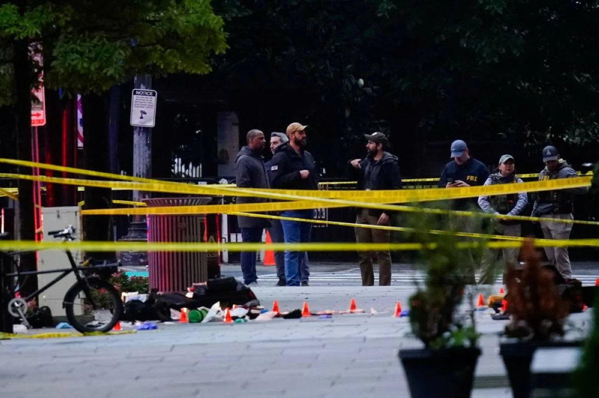 FBI agents stand in a cordoned-off area near the White House after a shooting incident in Washington, D.C., U.S., May 23, 2026. REUTERS