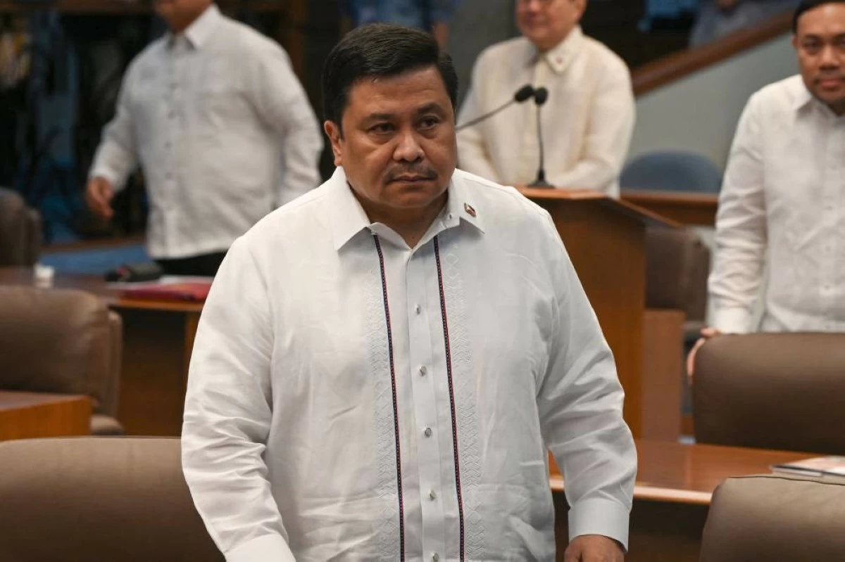 Philippine Senator Jose Jinggoy Estrada (C) attends a session at the senate plenary hall in Manila, in this photo taken on May 18, 2026. Philippine prosecutors filed criminal charges on May 28 against a senator allegedly involved in a massive corruption scandal over bogus flood control projects. (Photo by Ted ALJIBE / AFP)