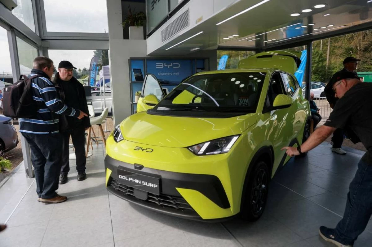 isitors view a BYD Dolphin surf electric car on display at the Everything Electric North show in Harrogate, Britain May 8, 2026. (Reuters)