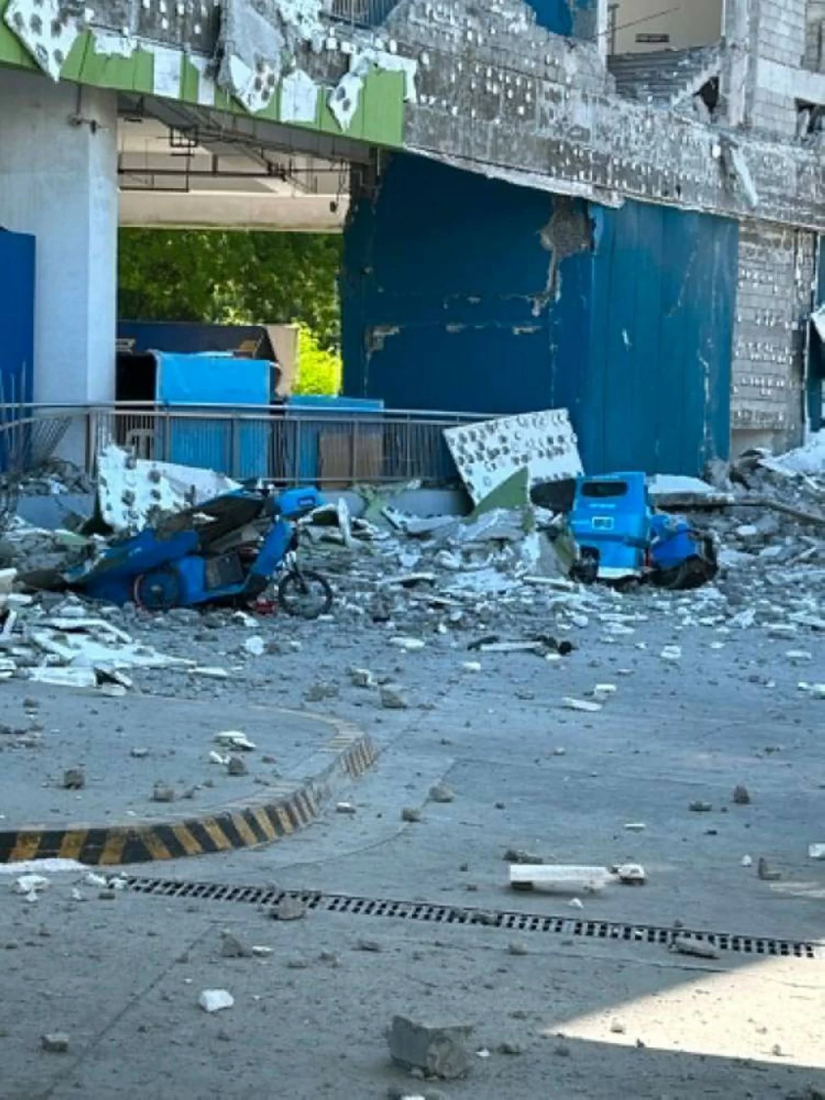Vehicles damaged by debris after powerful earthquake in the Mindanao region, Philippines Monday, June 8, 2026. AP