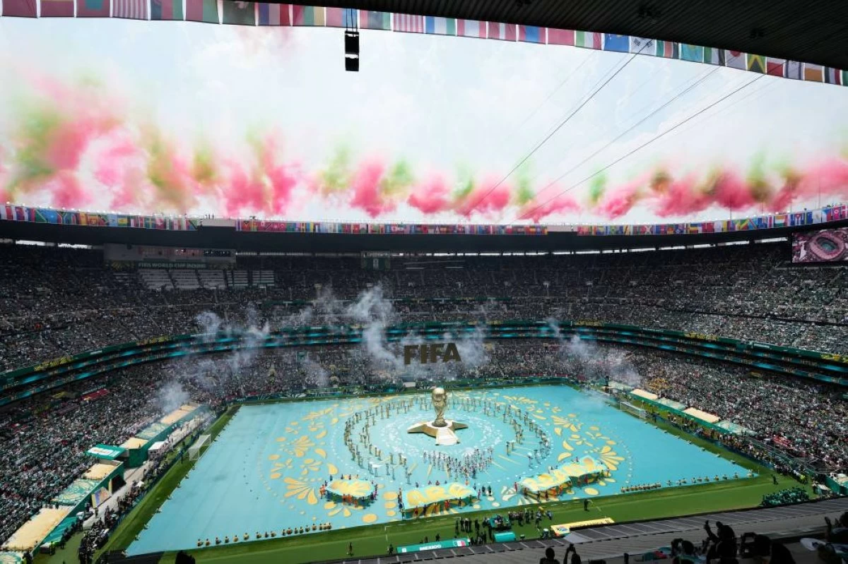 The packed stadium is seeing the first group match today, between Mexico and South Africa. Picture credit: AP