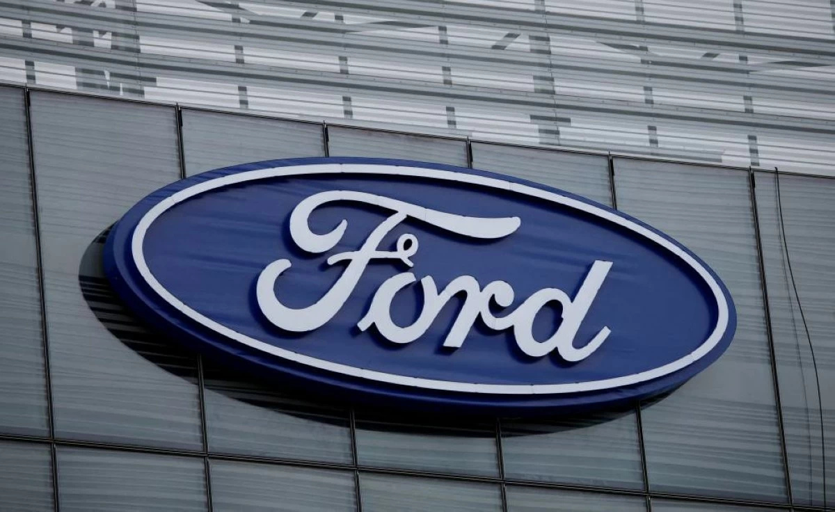 The blue Ford oval logo is displayed on the new Ford World Headquarters in Dearborn, Michigan, U.S. November 16, 2025.