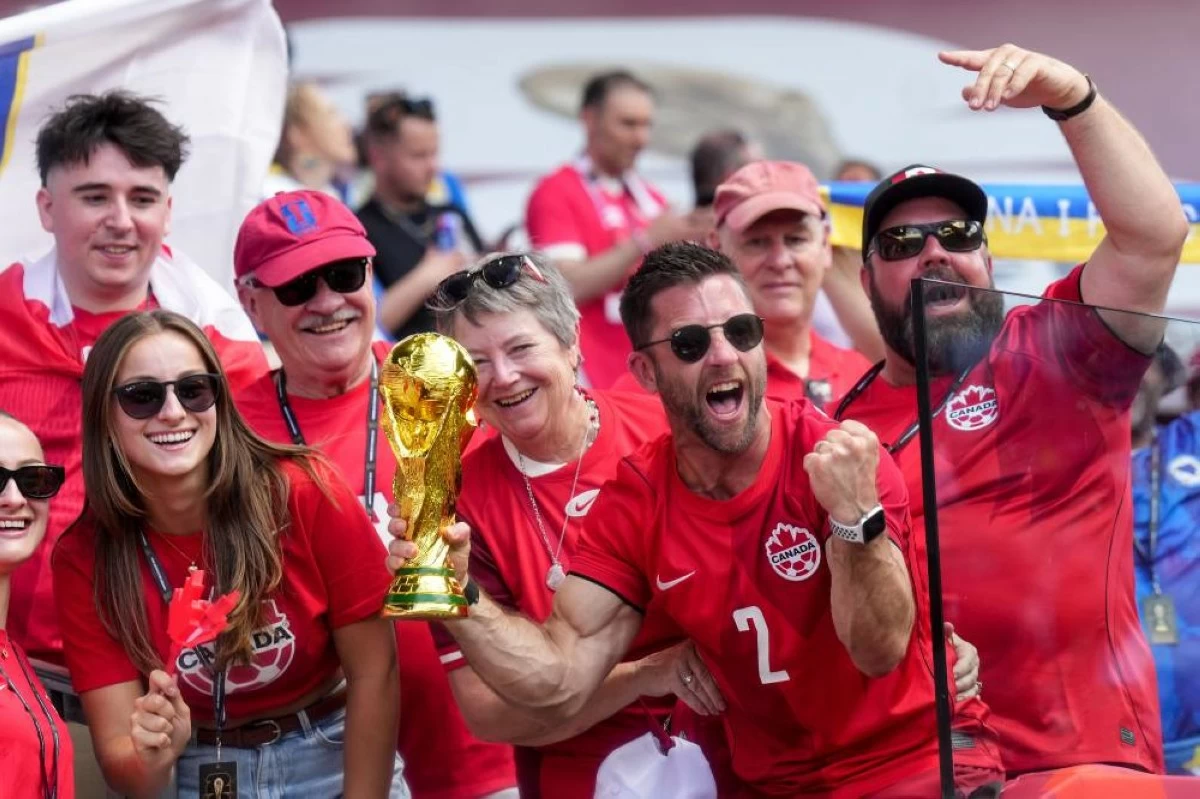 Canadian fans cheer for their team ahead of the game. Picture credit: AP