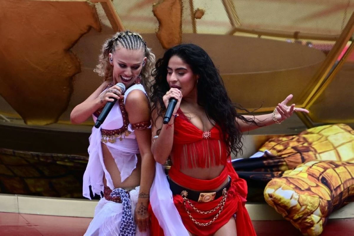 Jessie Reyez, right, and Elyanna, perform during the opening ceremony prior to group B World Cup soccer action between Canada and Bosnia and Herzegovina. Picture credit: AP