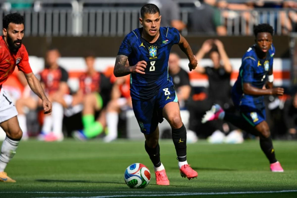 Brazil's Bruno Guimarães (8) advances the ball during an international friendly football match against Egypt in Cleveland, Saturday, June 6. Picture credit: AP