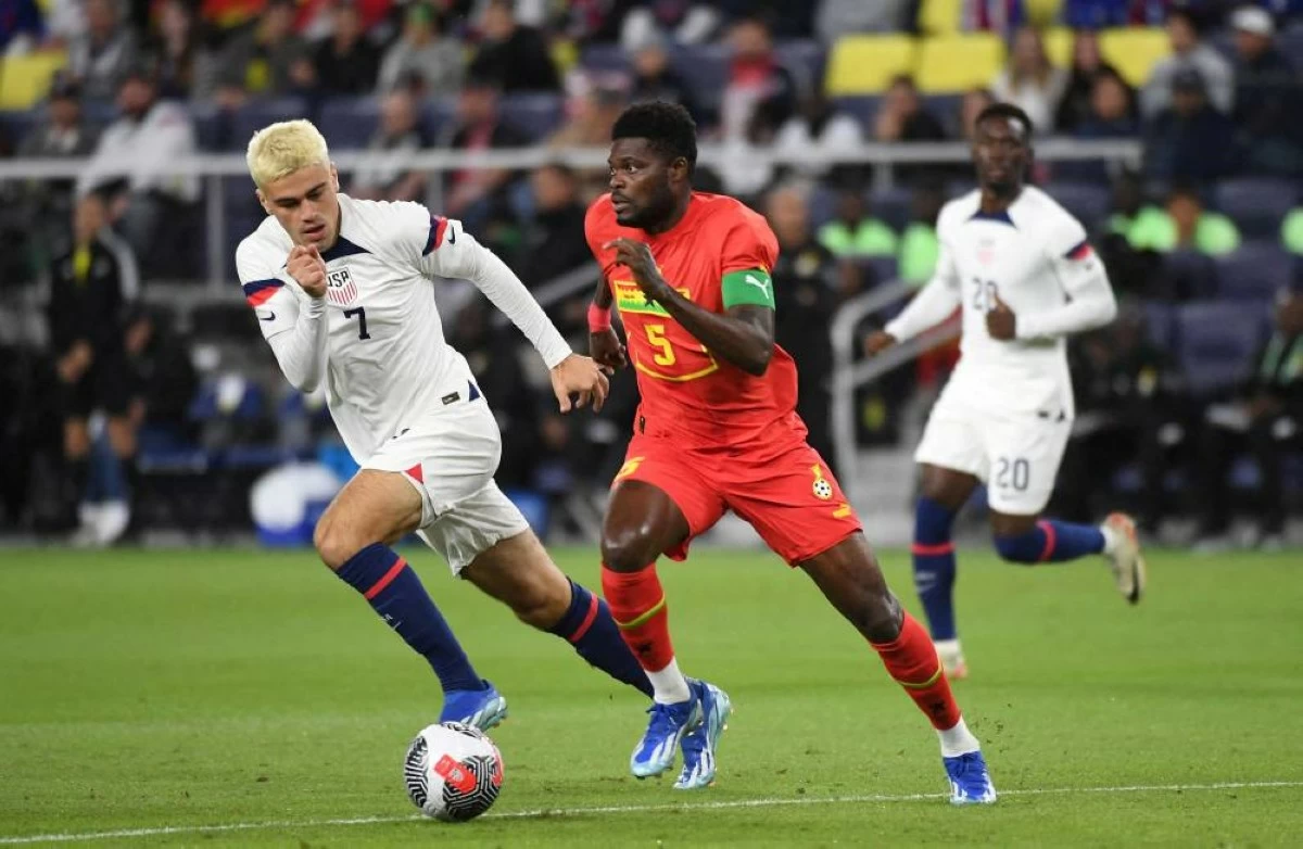 Ghana midfielder Thomas Partey (5) handles the ball against United States midfielder Gio Reyna (7) during the first half at GEODIS Park. Reuters