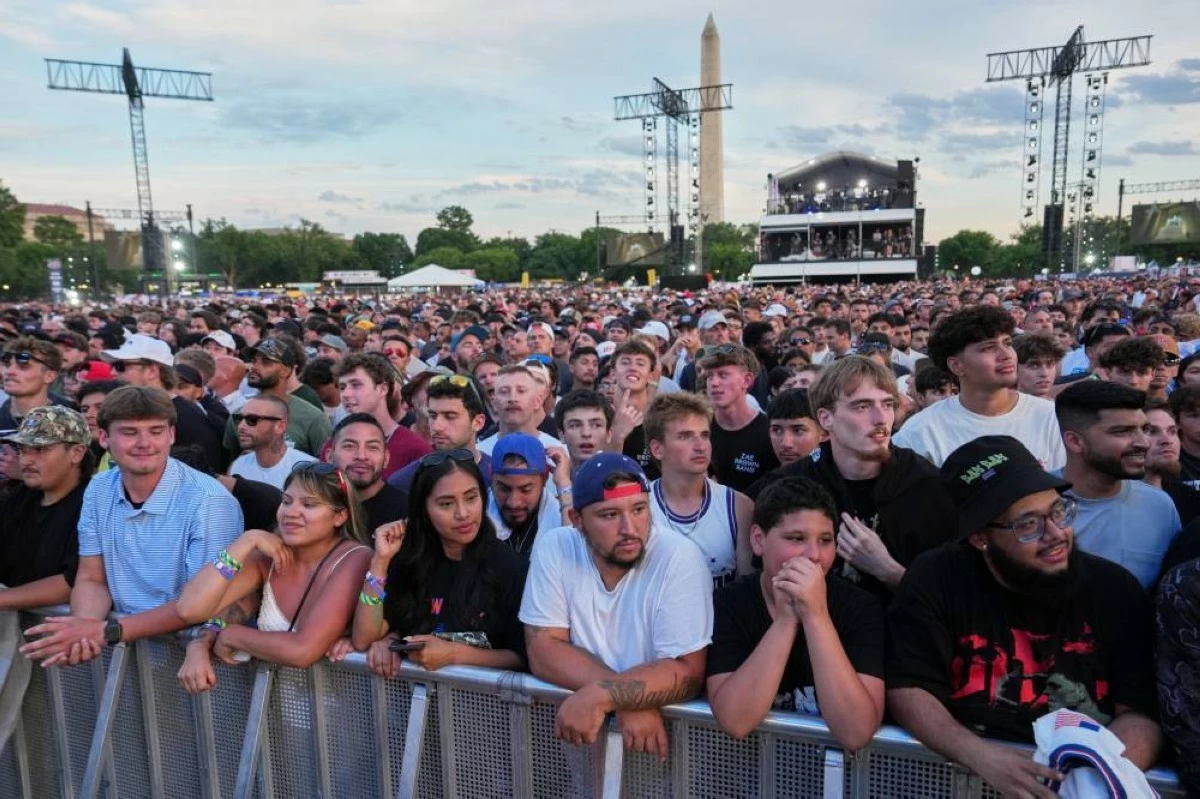 Fans take position before the ceremonial UFC Freedom 250 weigh-ins on the Ellipse, Saturday, June 13, 2026, in Washington, ahead of Sunday's fight on the South Lawn of the White House.AP