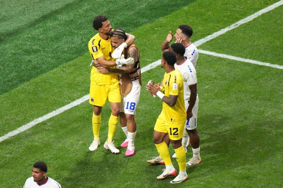 Cape Verde goalkeeper Vozinha (1) hugs Telmo Arcanjo (18) after a 0-0 draw during the World Cup Group H soccer match between Spain and Cape Verde in Atlanta, Monday, June 15, 2026. (AP)