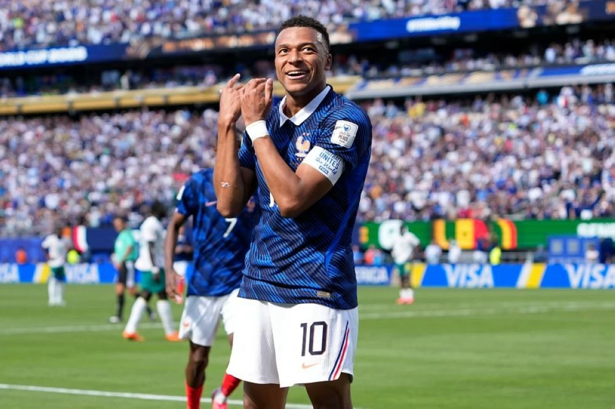 France's Kylian Mbappe celebrates after scoring the opening goal of his team during the World Cup Group I soccer match between France and Senegal in East Rutherford, N.J. Picture credit: AP