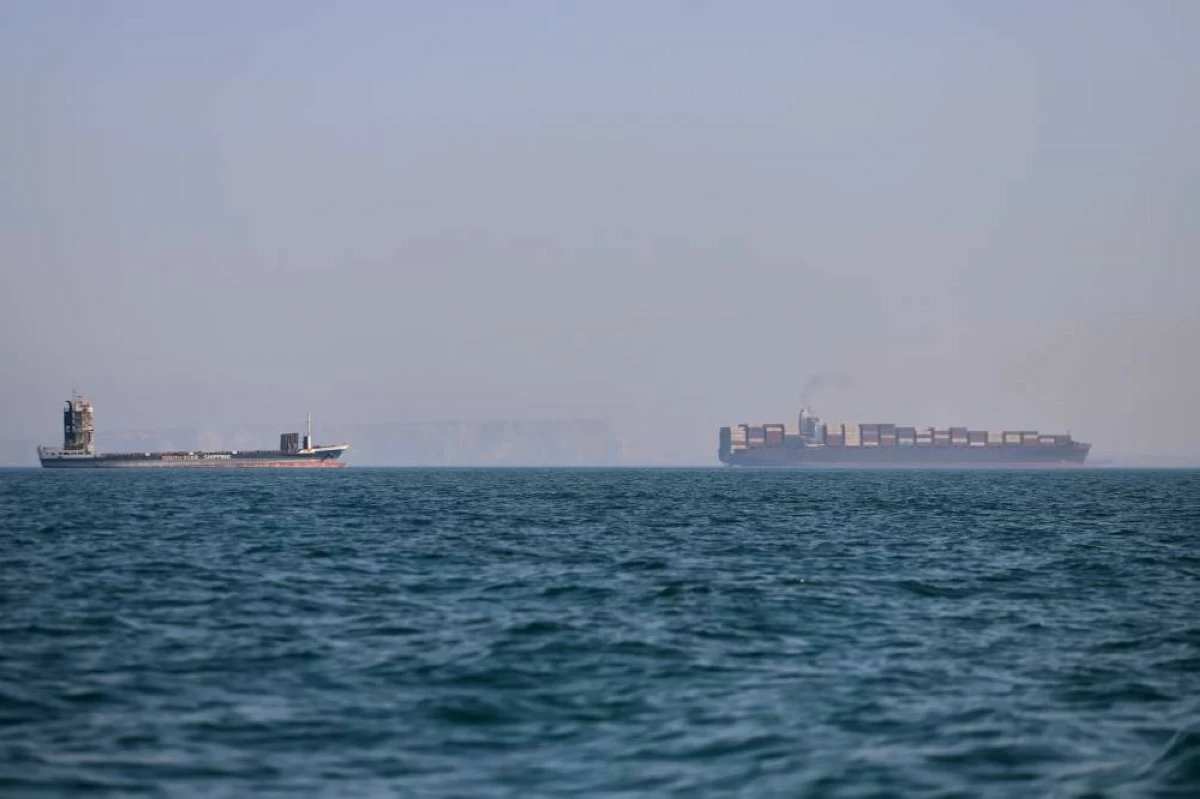 First tankers cross strait after Iran deal as Israeli strikes in Lebanon raise doubts
