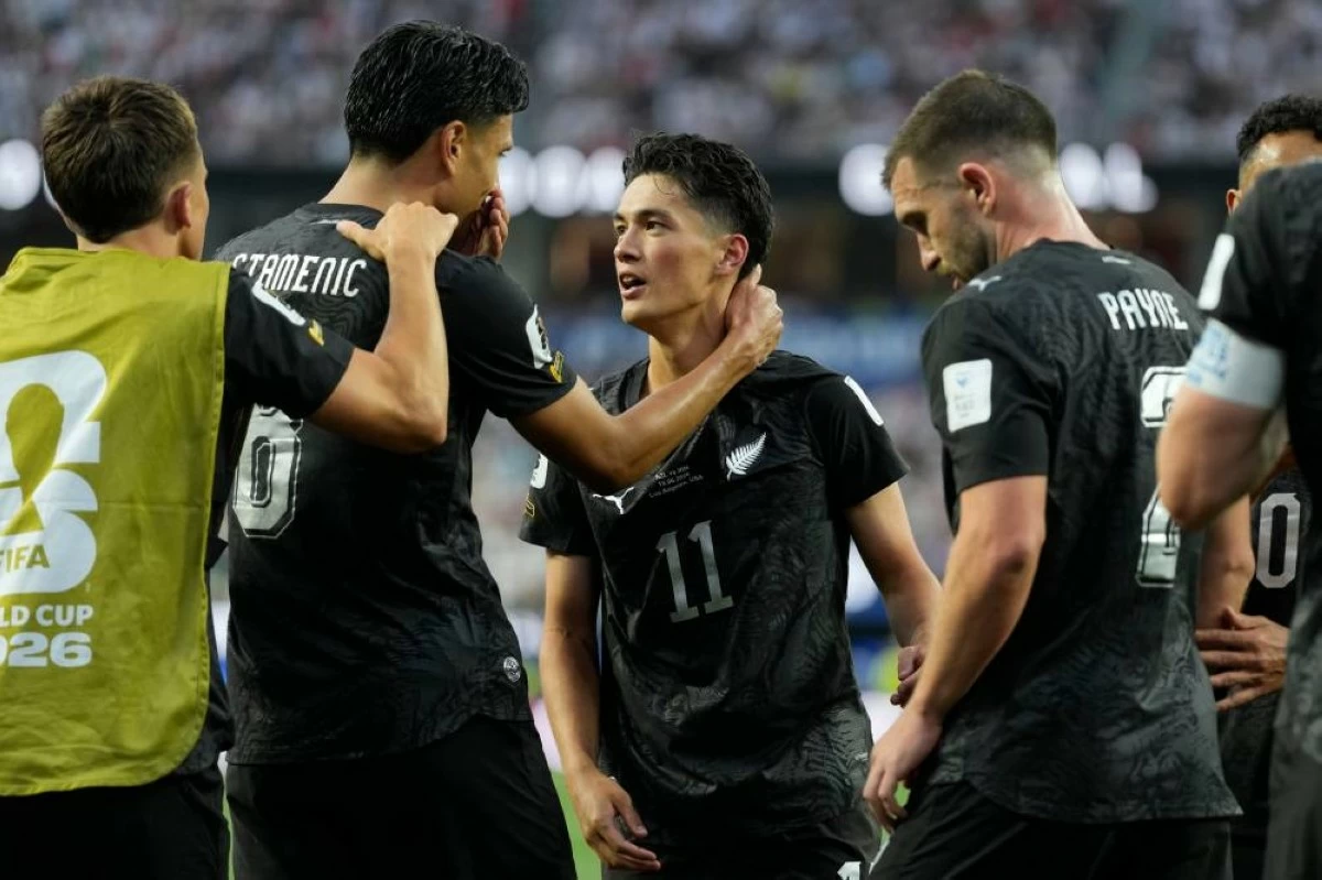 New Zealand's Elijah Just (11) celebrates with his teammates after scoring a goal during the World Cup Group G soccer match between Iran and New Zealand in California, US. File photograph. Picture credit: AP