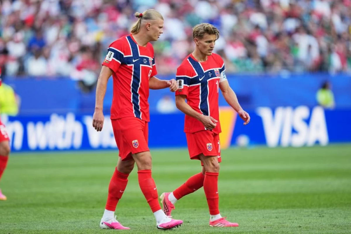 Norway's Erling Haaland, left, and Martin Oedegaard talk during the World Cup Group I soccer match between Iraq and Norway in Foxborough, Mass., near Boston. Picture credit: AP