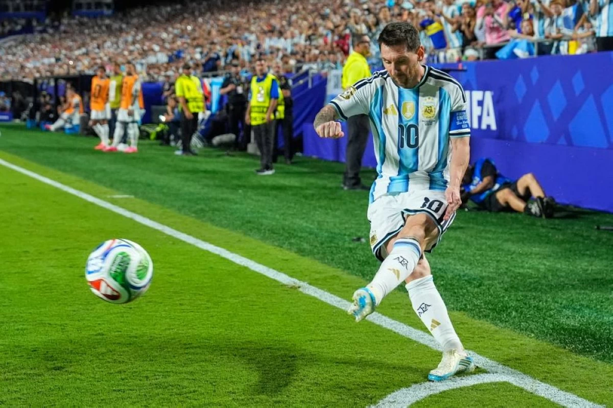 Argentina's Lionel Messi takes a corner kick during the World Cup Group J soccer match between Argentina and Algeria in Kansas City. Picture credit: AP