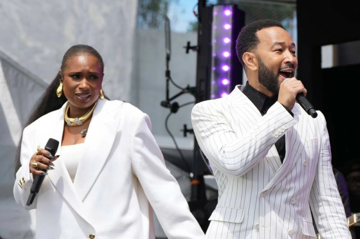 Jennifer Hudson and John Legend performing during the dedication ceremony for the Obama Presidential Center, Thursday, June 18, 2026, in Chicago. (AP Photo/Alex Brandon)