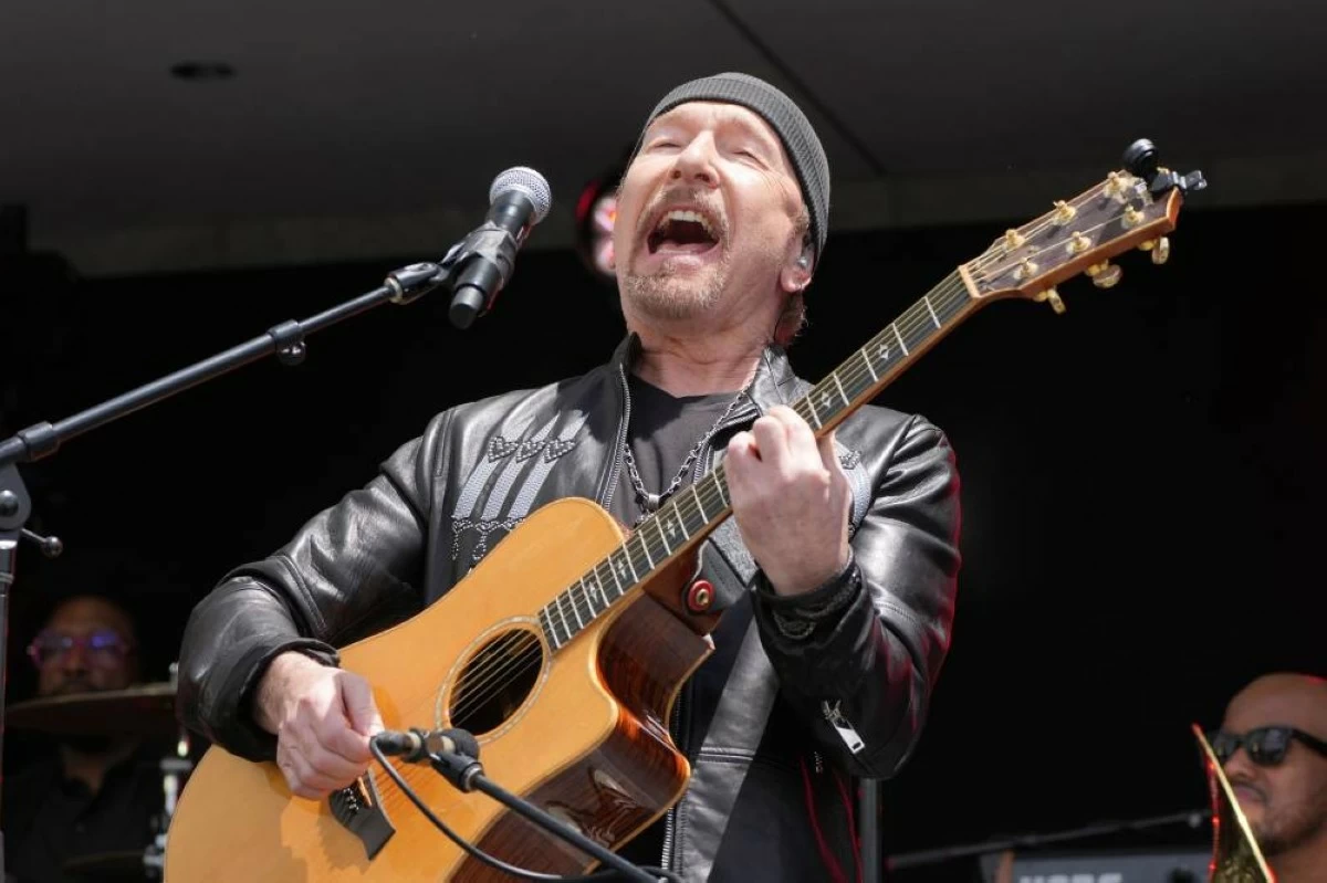Member of the rock band U2, the Edge performing at the dedication ceremony for the Obama Presidential Center, Thursday, June 18, 2026, in Chicago. (AP Photo/Alex Brandon)