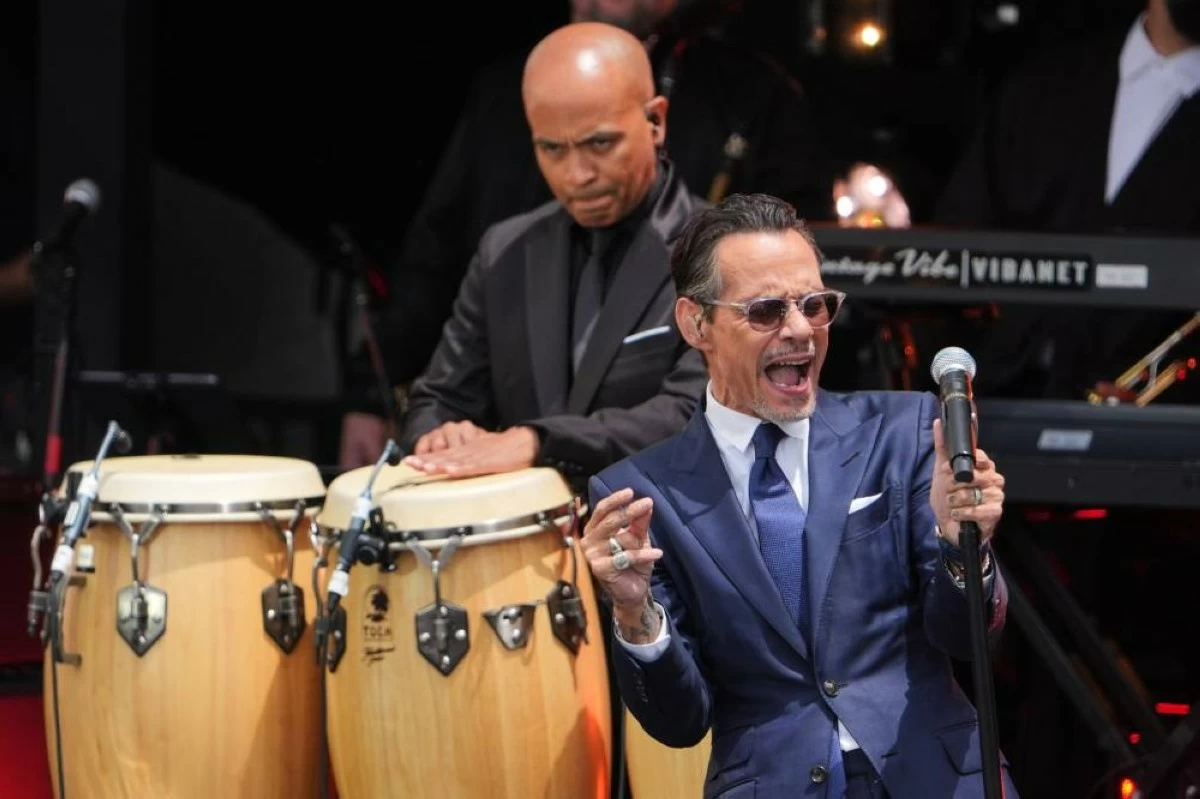 Singer Marc Anthony performs during the dedication ceremony for the Obama Presidential Center, Thursday, June 18, 2026, in Chicago. (AP Photo/Jeff Roberson)