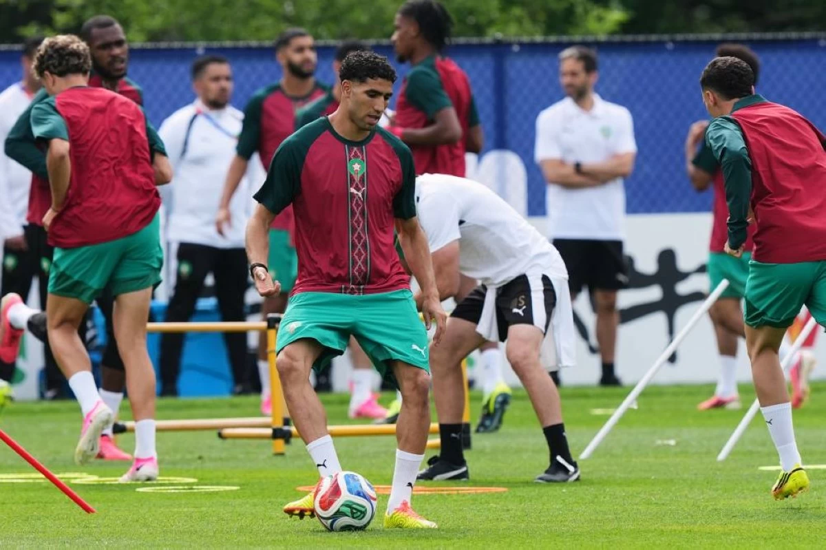 Morocco's Achraf Hakimi exercises during a training session ahead of the World Cup Group C soccer match between Scotland and Morocco in Foxborough, Mass., near Boston, Thursday, June 18, 2026. (AP)