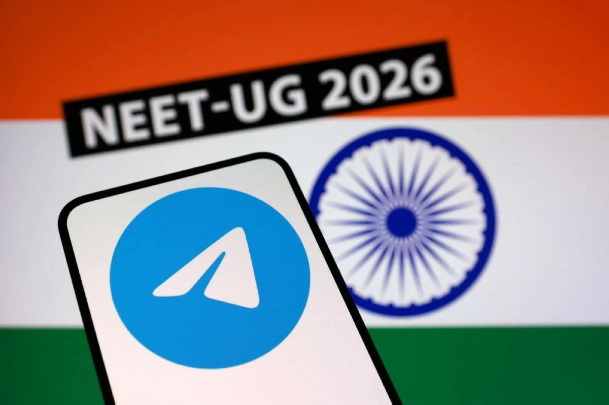 Indian flag, Telegram app logo and words "Neet-UG 2026" are seen in this illustration taken June 19, 2026. REUTERS