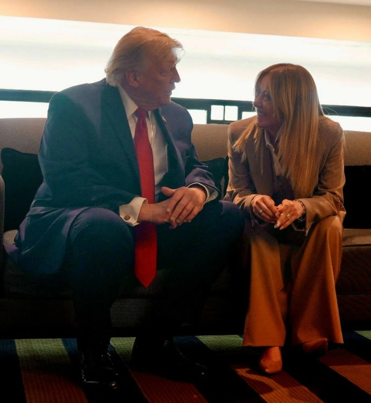 US President Donald Trump speaks to Italian Prime Minister Giorgia Meloni on the sidelines of the G7 Summit in Evian-les-Bains, France, June 17, 2026. (Reuters)