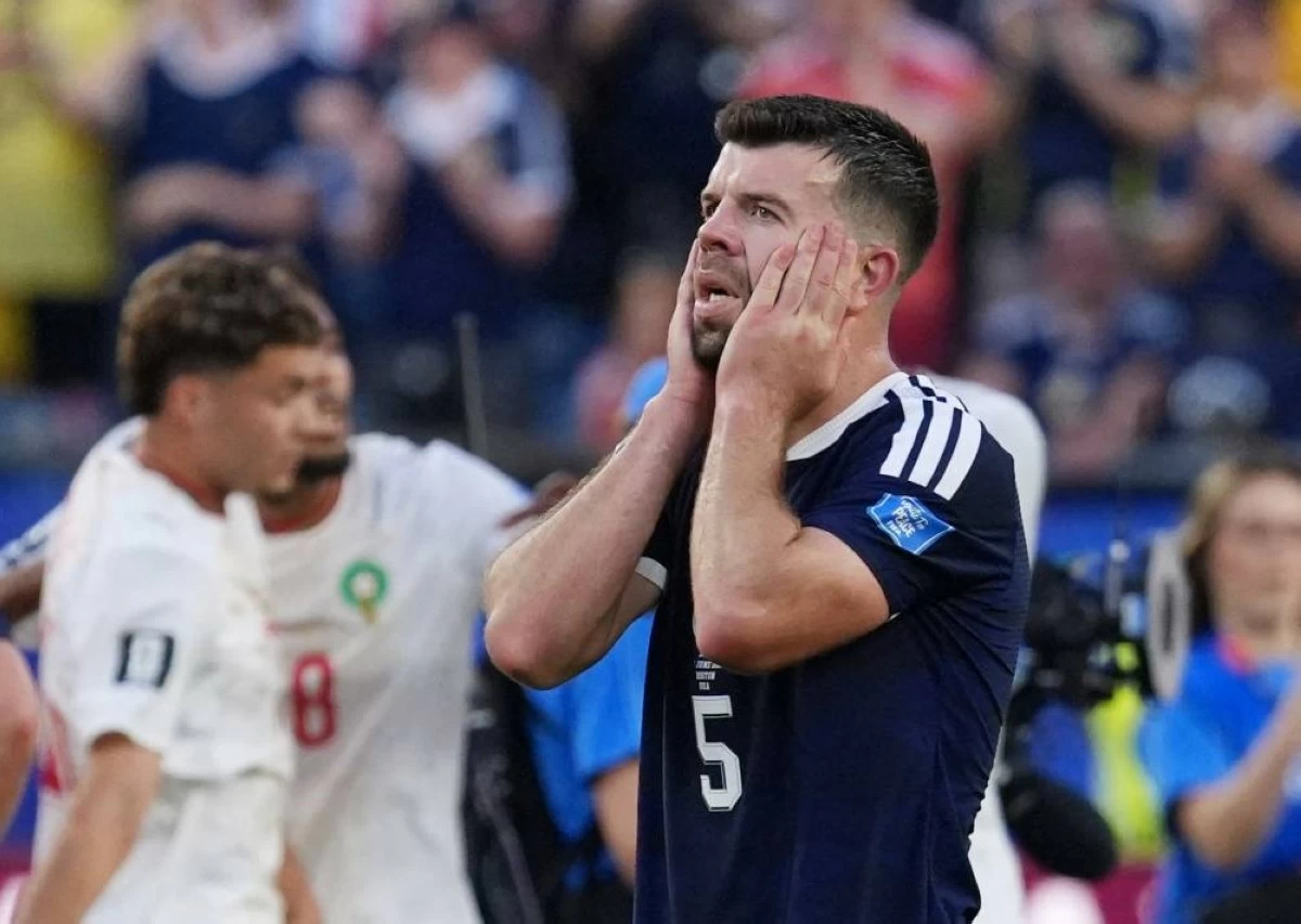 Scotland's Grant Hanley looks dejected after the match. Picture credit: Reuters