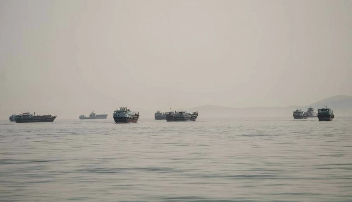 Vessels are anchored in the Strait of Hormuz, as seen from Musandam, Oman, June 19, 2026. REUTERS