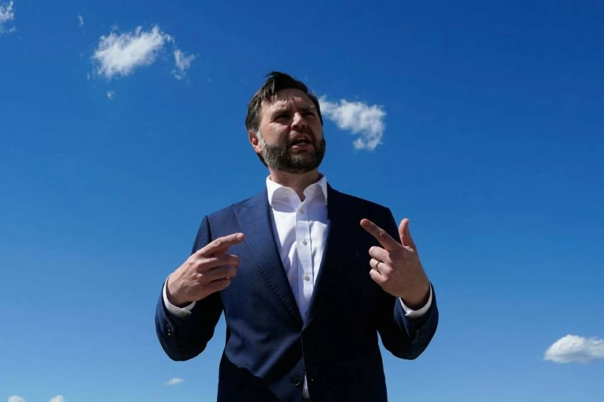 U.S. Vice President J.D. Vance speaks to reporters at Joint Base Andrews, Maryland, U.S. Vance landed at Emmen Air Base early Sunday, joining American envoys already on the ground, as Iranian negotiators had also arrived ahead of the high-level discussions. REUTERS
