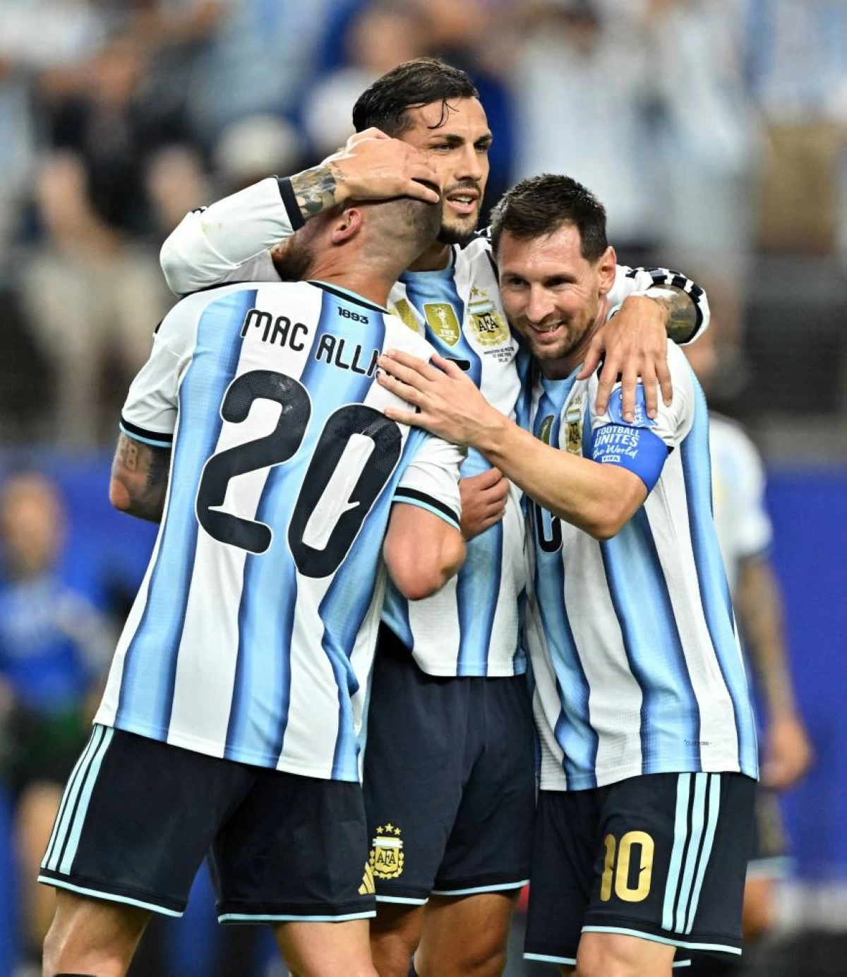 Argentina's Lionel Messi, Leandro Paredes and Alexis Mac Allister celebrate after the match. Picture credit: Reuters