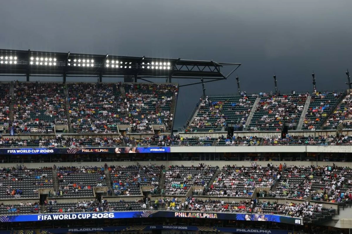 Fans return to the stands as the second half is delayed due to severe weather. Picture credit: Reuters