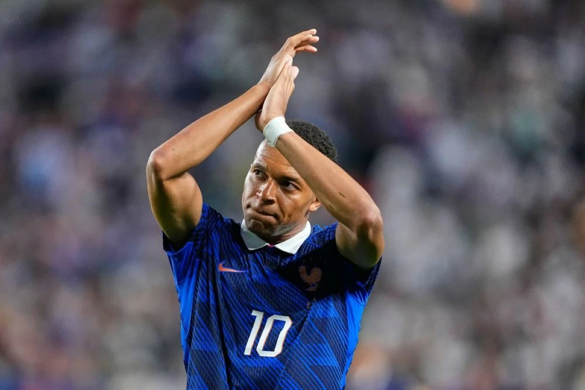 France's Kylian Mbappe (10) gestures to fans as he leaves the field during the World Cup Group I soccer match between France and Iraq in Philadelphia. Picture credit: AP