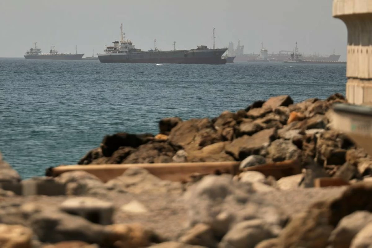Tankers and cargo vessels are seen in the Gulf of Oman, along shipping routes linking the Strait of Hormuz and the Arabian Sea, Tuesday, June 16, 2026. (AP)