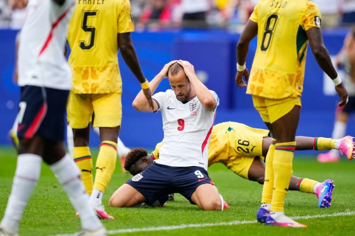 England's Harry Kane (9) reacts after missing a shot on goal during the World Cup Group L soccer match between England and Ghana in Foxborough, Mass. Picture credit: AP