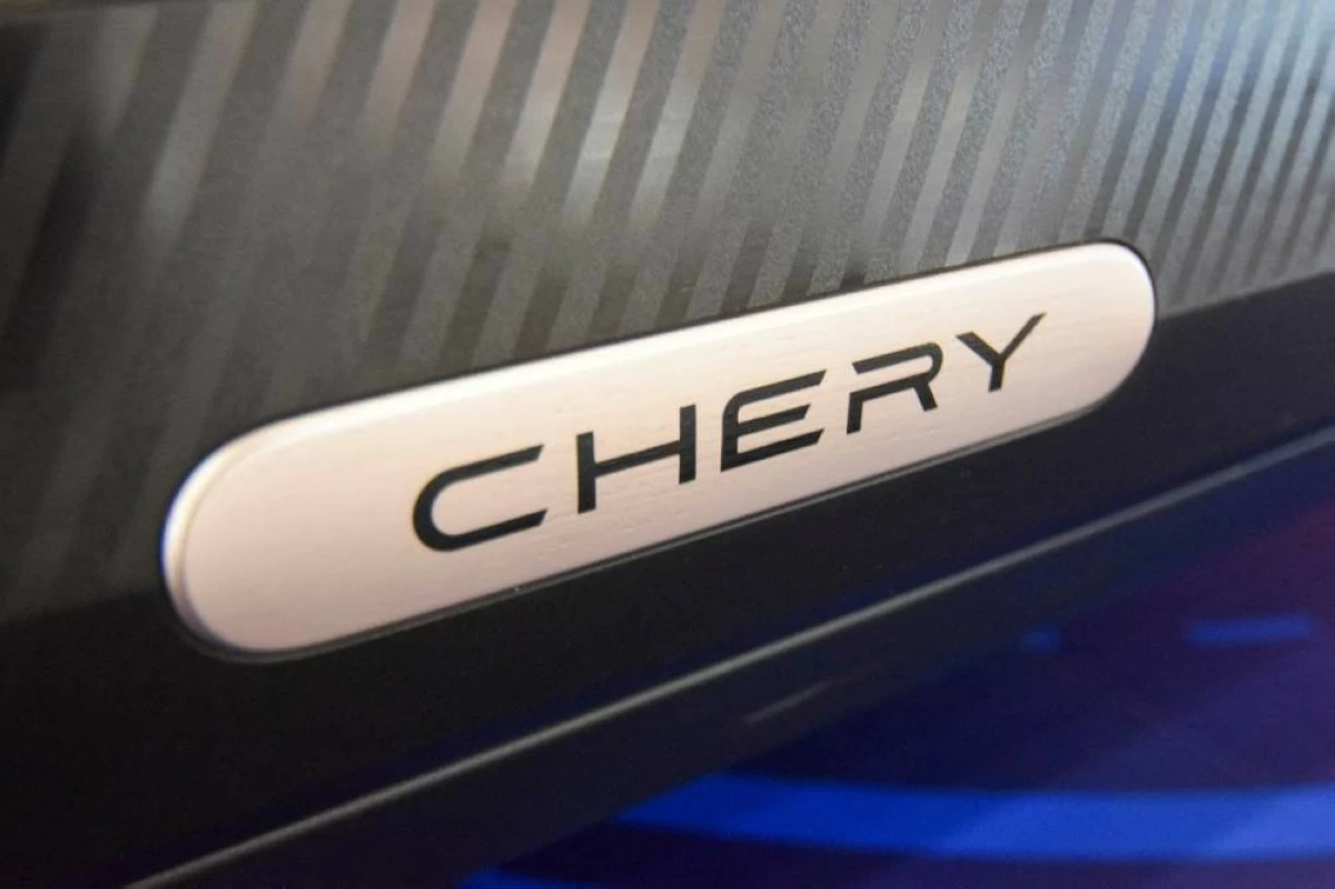 A logo on a Chery QQ electric vehicle at the headquarters of Chery brands Omoda and Jaecoo in Wuhu, China, April 26, 2026. REUTERS