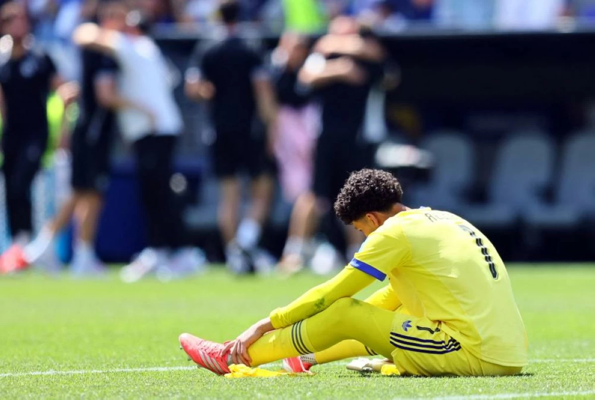 Qatar's Mahmoud Abunada looks dejected after the match. Picture credit: Reuters
