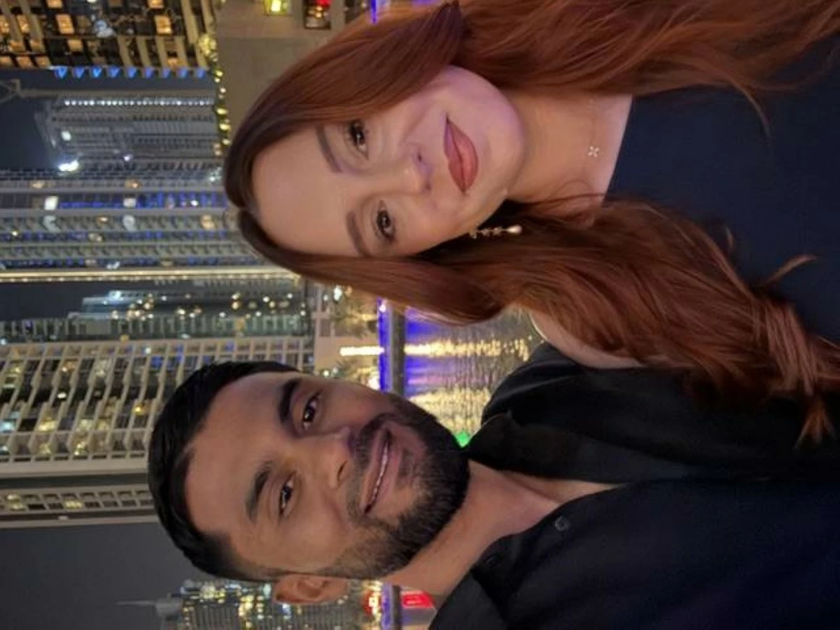 Cooper with her husband Afsar Uddin. The couple moved to Dubai from London in early 2025, with their cats. Picture credit: Supplied