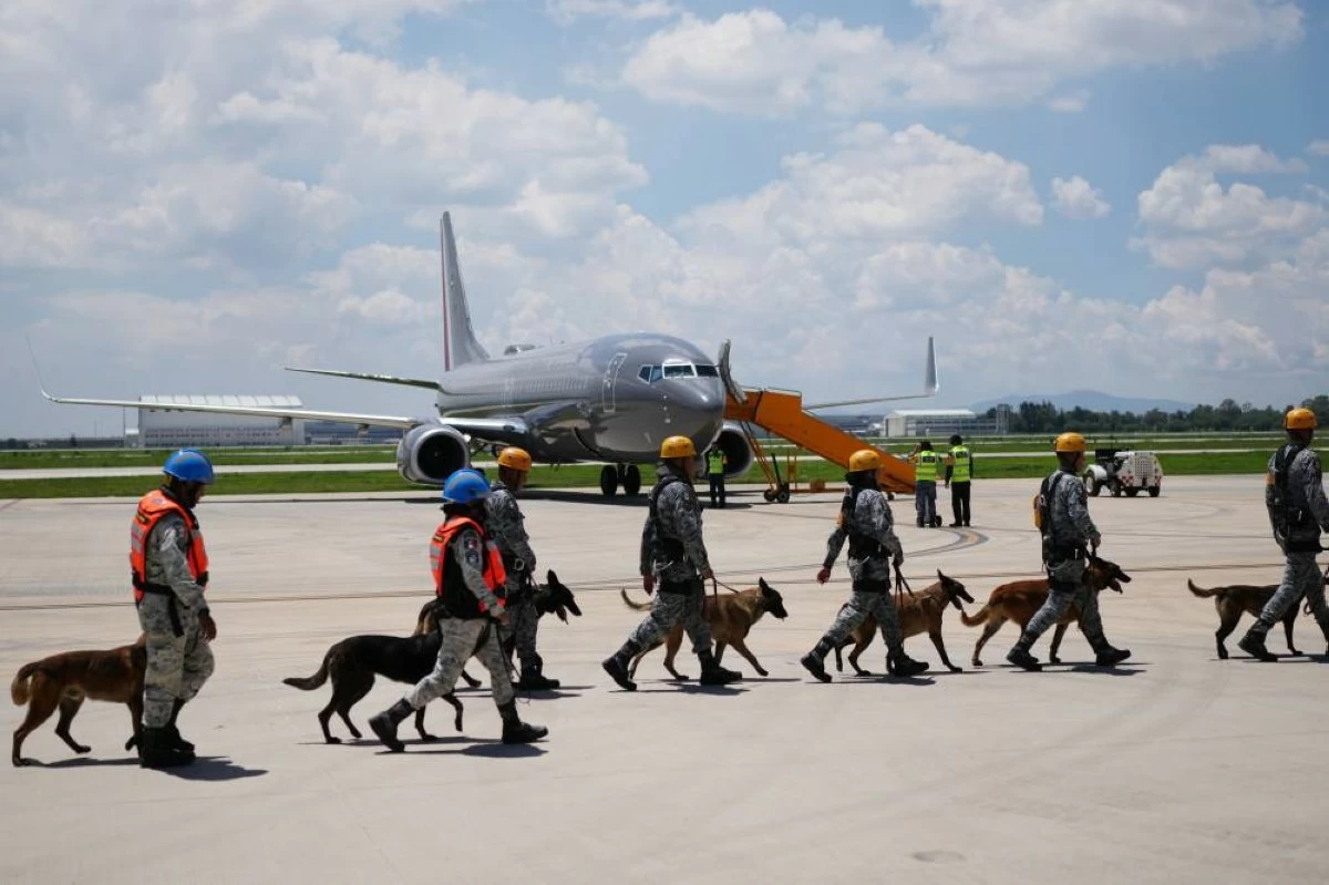Members of a Mexican Army search-and-rescue team depart from an air base in Mexico City for Venezuela to help search for victims of the earthquake that struck the country a day earlier, Thursday, June 25, 2026. (AP Photo/Matias Delacorix)