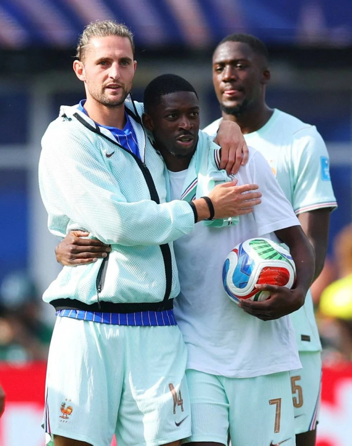 France's Ousmane Dembele celebrates with Adrien Rabiot, Ibrahima Konate and the match ball after the match after scoring a hat-trick. Picture credit: Reuters