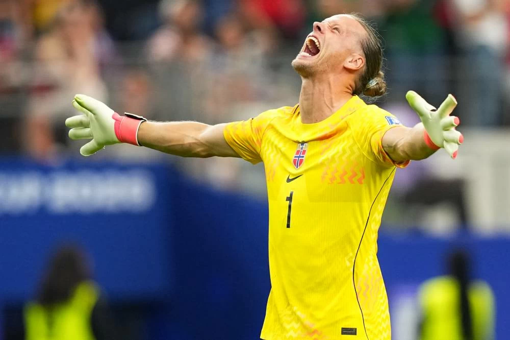 Norway goalkeeper Oerjan Nyland (1) reacts after Erling Haaland (9) scored his side's second goal during the World Cup round of 32 soccer match between Ivory Coast and Norway in Arlington, Texas. Picture credit: AP