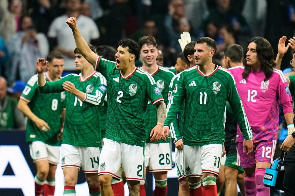 Mexico players celebrate their team's victory over Ecuador in the World Cup round of 32 soccer match in Mexico City, Tuesday, June 30, 2026. (AP Photo/Ricardo Mazalan)