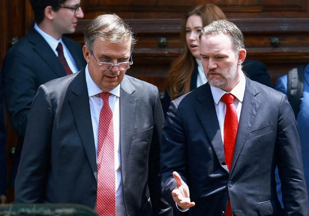 U.S. Trade Representative Jamieson Greer talks with Mexico's Economy Minister Marcelo Ebrard as they leave National Palace amid talks to review the U.S.-Mexico-Canada trade pact, in Mexico City, Mexico, April 20, 2026. REUTERS