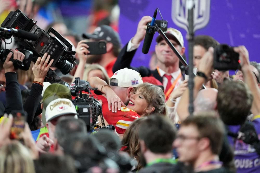 Kansas City Chiefs tight end Travis Kelce celebrates with girlfriend Taylor Swift after defeating the San Francisco 49ers in Super Bowl LVIII at Allegiant Stadium. (Credit: Mark J. Rebilas-USA TODAY Sports/File Photo)