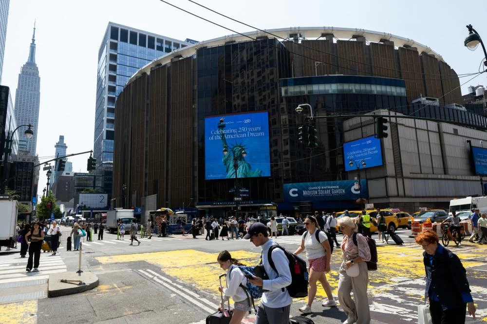 People walk in front of Madison Square Garden in New York City, U.S. June 30, 2026. REUTERS