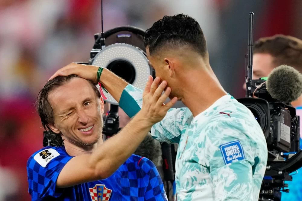 Croatia's Luka Modric (10) and Portugal's Cristiano Ronaldo (7) greet each other after the World Cup round of 32 soccer match between Portugal and Croatia in Toronto, Thursday, July 2, 2026. (AP)