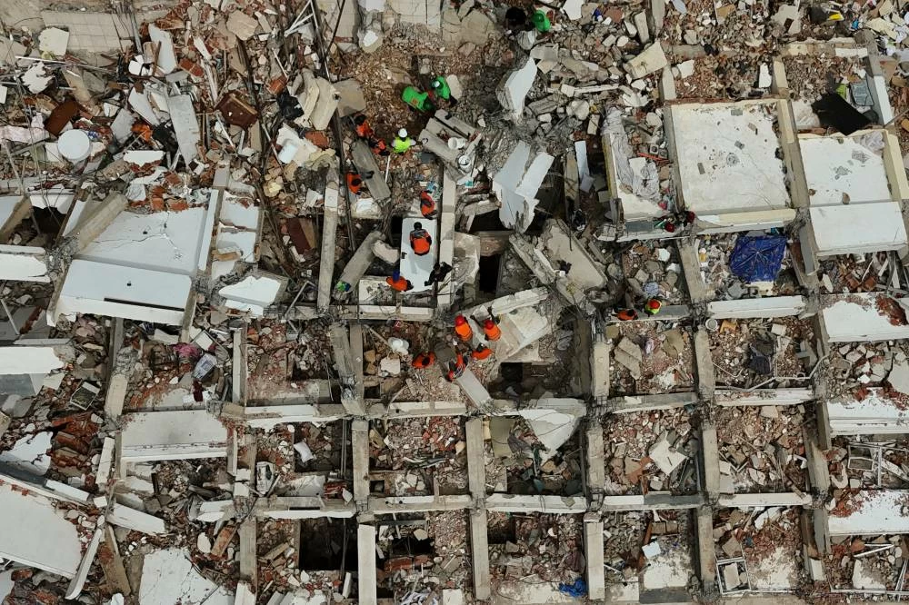 Rescue workers search through the rubble of a building destroyed by the earthquakes in La Guaira, Venezuela, Thursday, July 2, 2026. (AP)