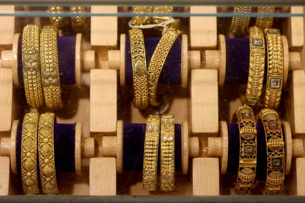 Gold bangles are displayed inside a jewellery store in the old quarters of Delhi, India. (Reuters)